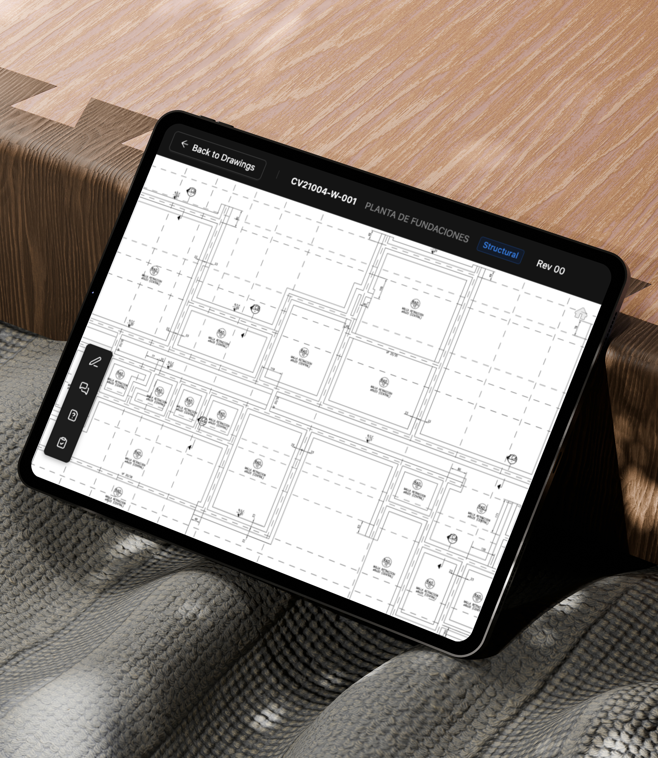 Construction drawings reviewed on a tablet